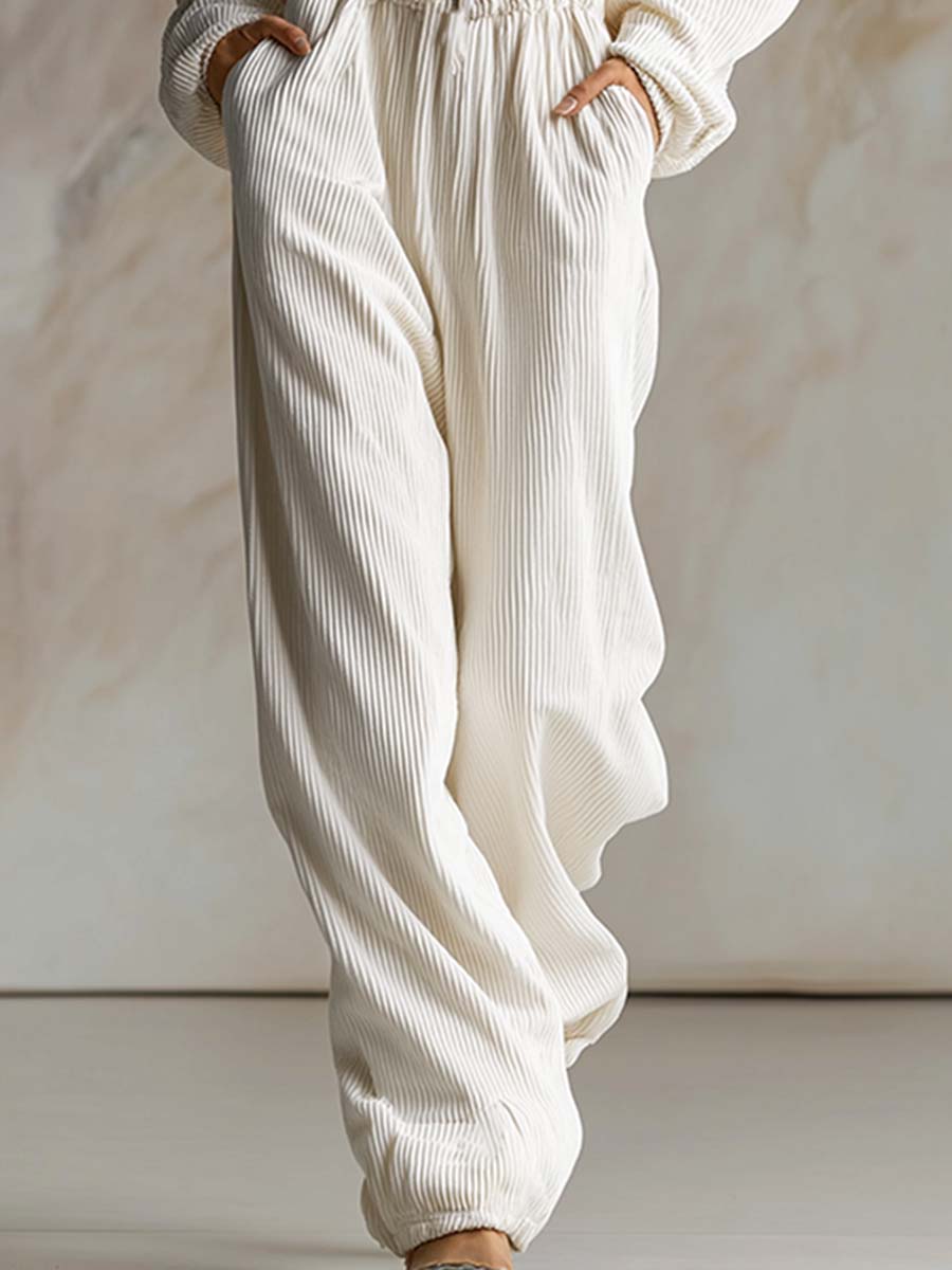 Casual loose fashionable white corduroy hooded jumpsuit with front zipper and long sleeves