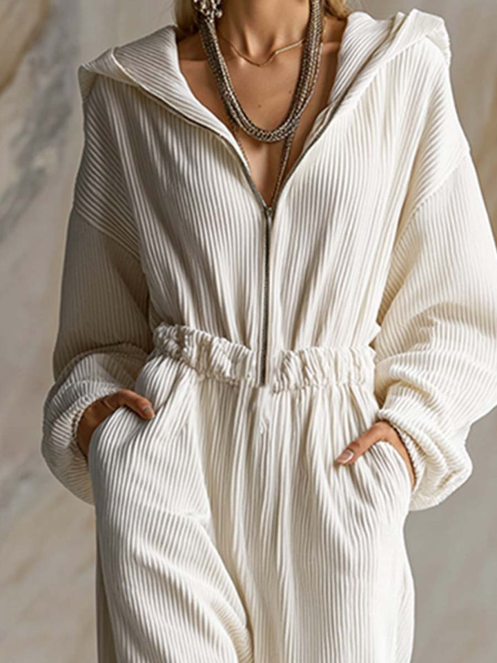 Casual loose fashionable white corduroy hooded jumpsuit with front zipper and long sleeves