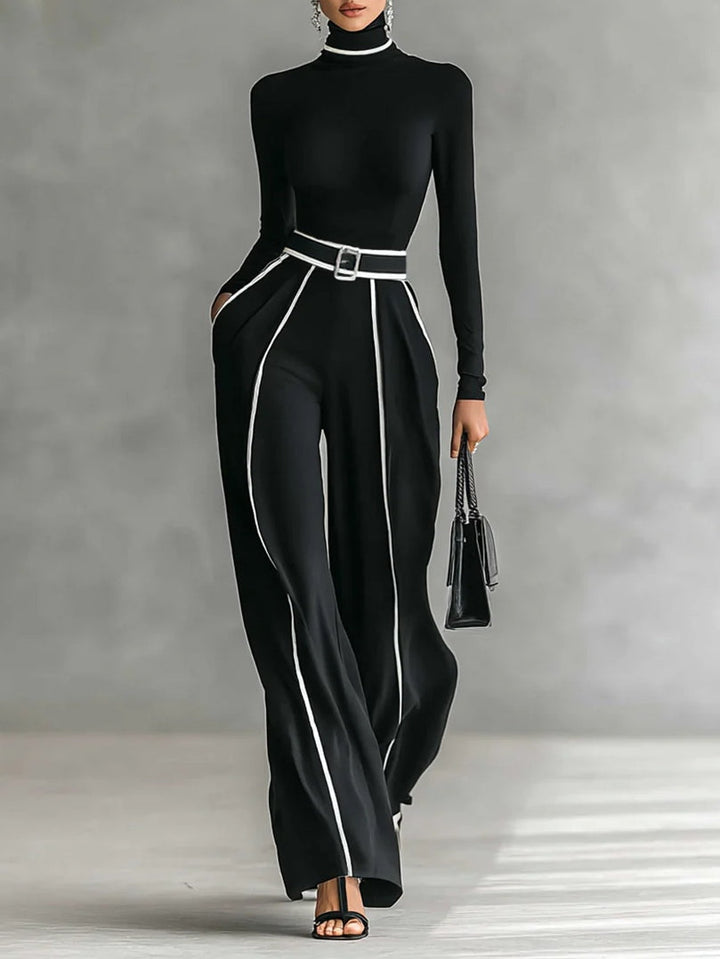 Set with finished top featuring a high neck and long sleeves, wide pants, and belt